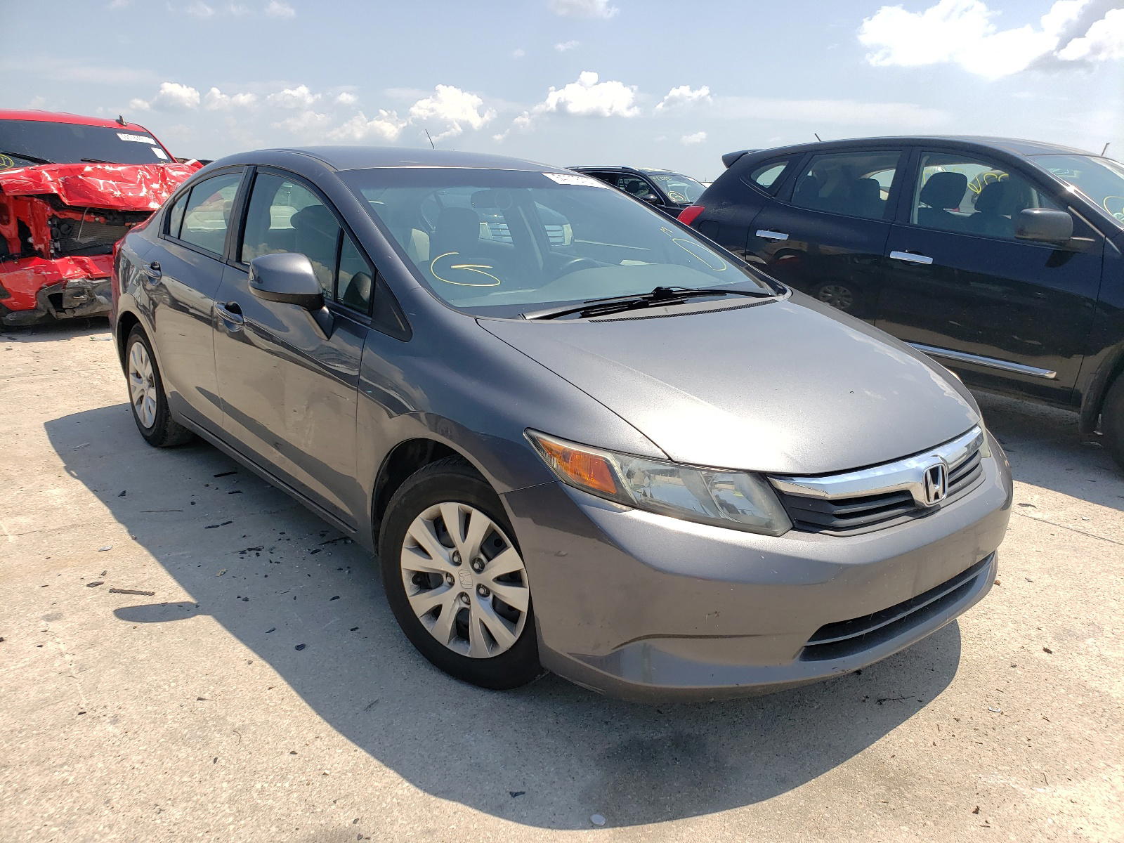 HONDA CIVIC LX 2012 with VIN 19XFB2F5XCE338679 - Photo from auction