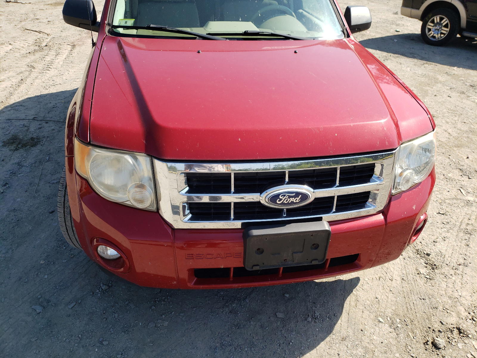 Photo 9 from auction – 2010 FORD ESCAPE with VIN 1FMCU9D71AKD16215