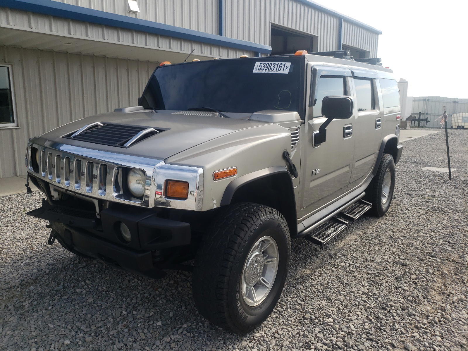 Photo 2 from auction – 2003 HUMMER H2 with VIN 5GRGN23U23H101426