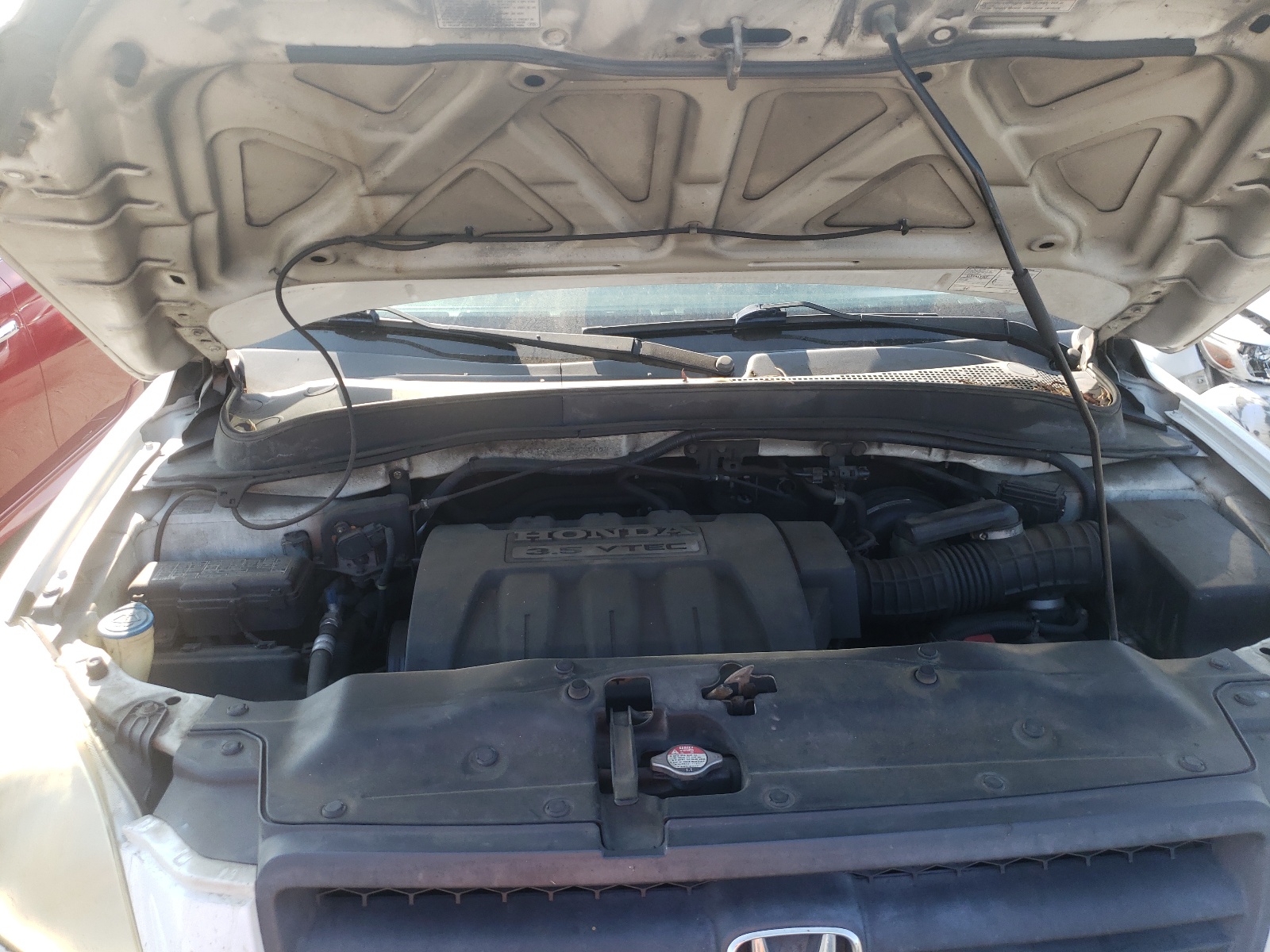 Photo 7 from auction – 2005 HONDA PILOT EXL with VIN 2HKYF18585H535563