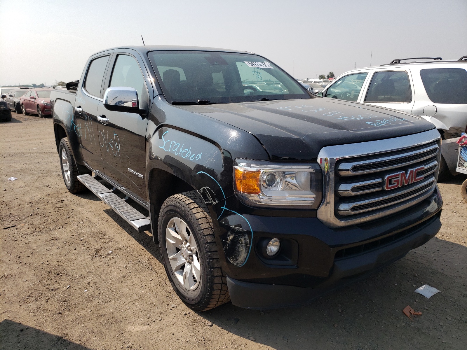 GMC CANYON SLE 2015 with VIN 1GTG6BE38F1171948 - Photo from auction