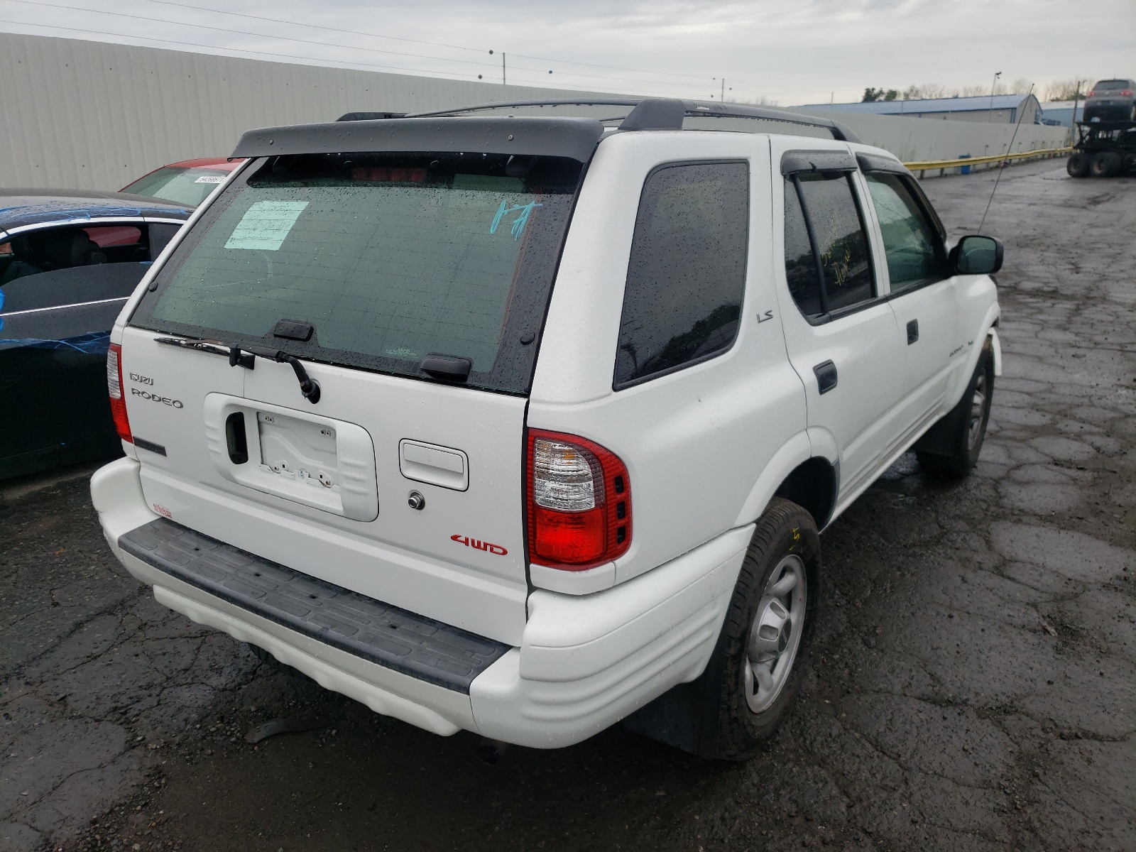 Zdjęcie 4 z aukcji – 2001 ISUZU RODEO S z VIN 4S2DM58W314353553