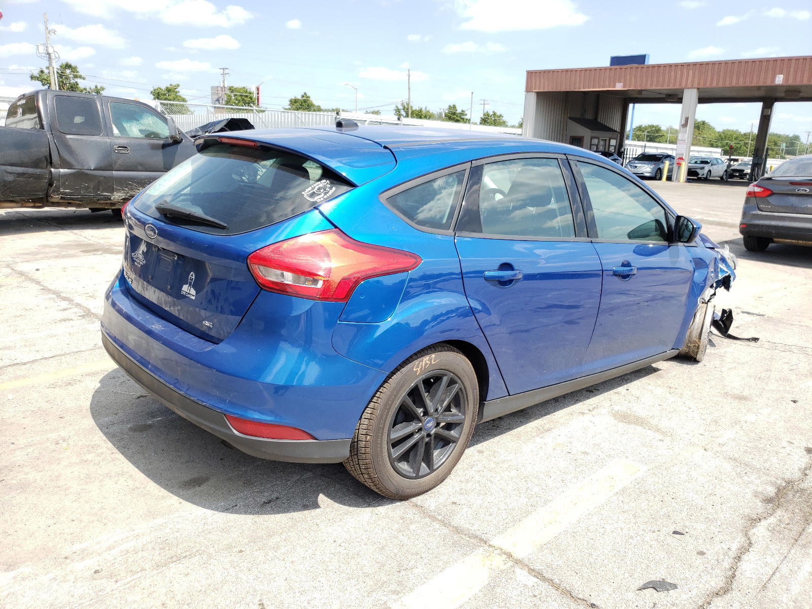 Photo 4 from auction – 2018 FORD FOCUS SE with VIN 1FADP3K29JL206047
