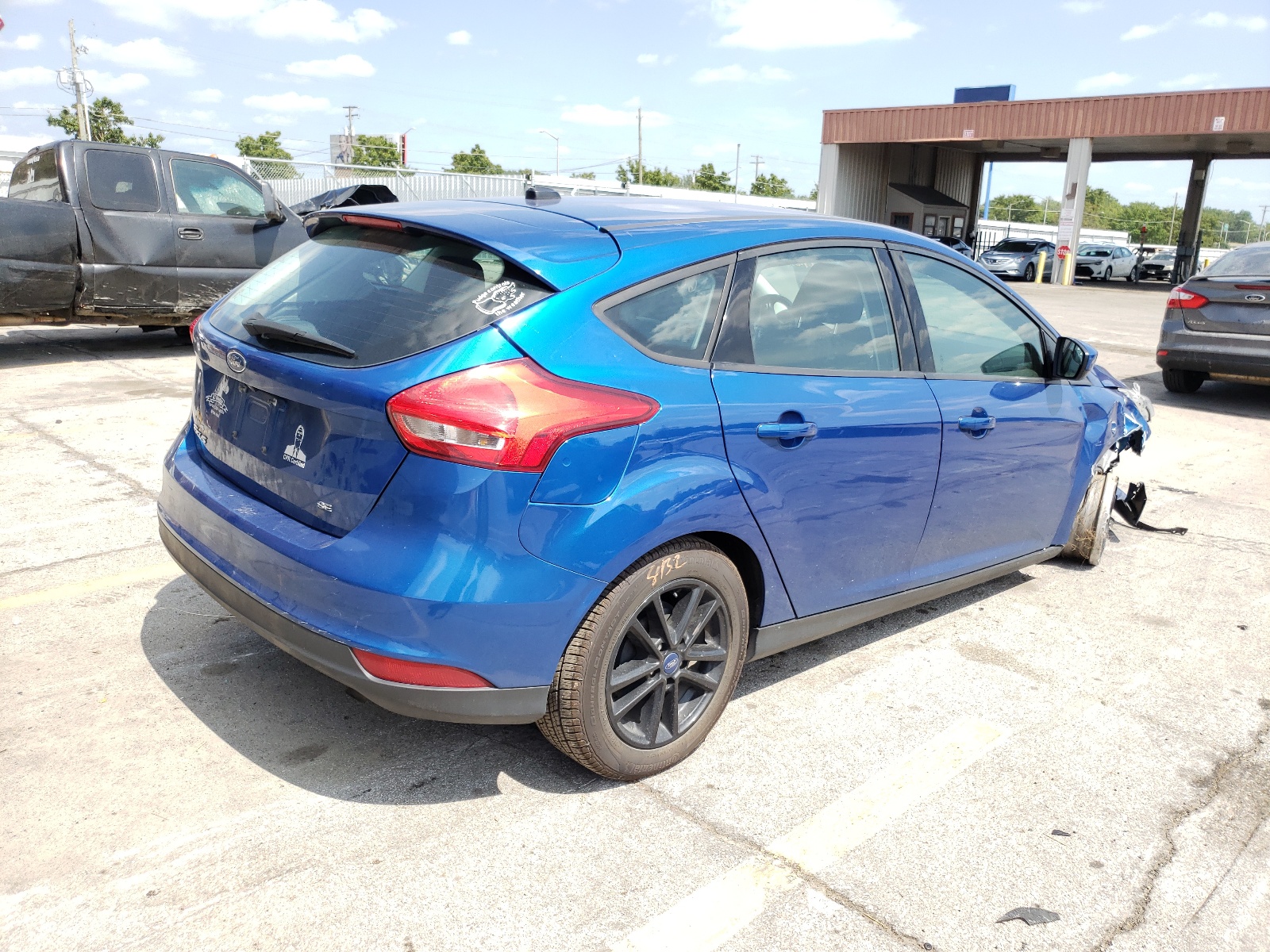 Zdjęcie 4 z aukcji – 2018 FORD FOCUS SE z VIN 1FADP3K29JL206047