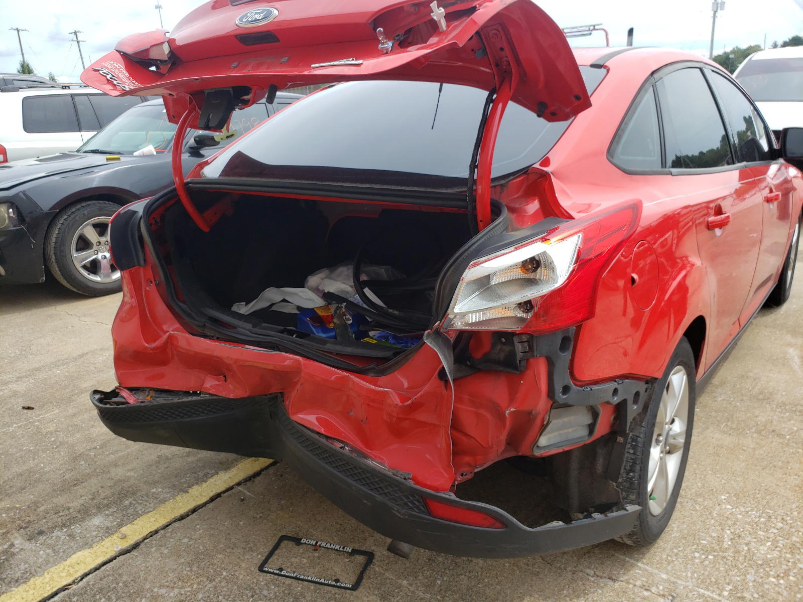 Photo 9 from auction – 2013 FORD FOCUS SE with VIN 1FADP3F24DL380381