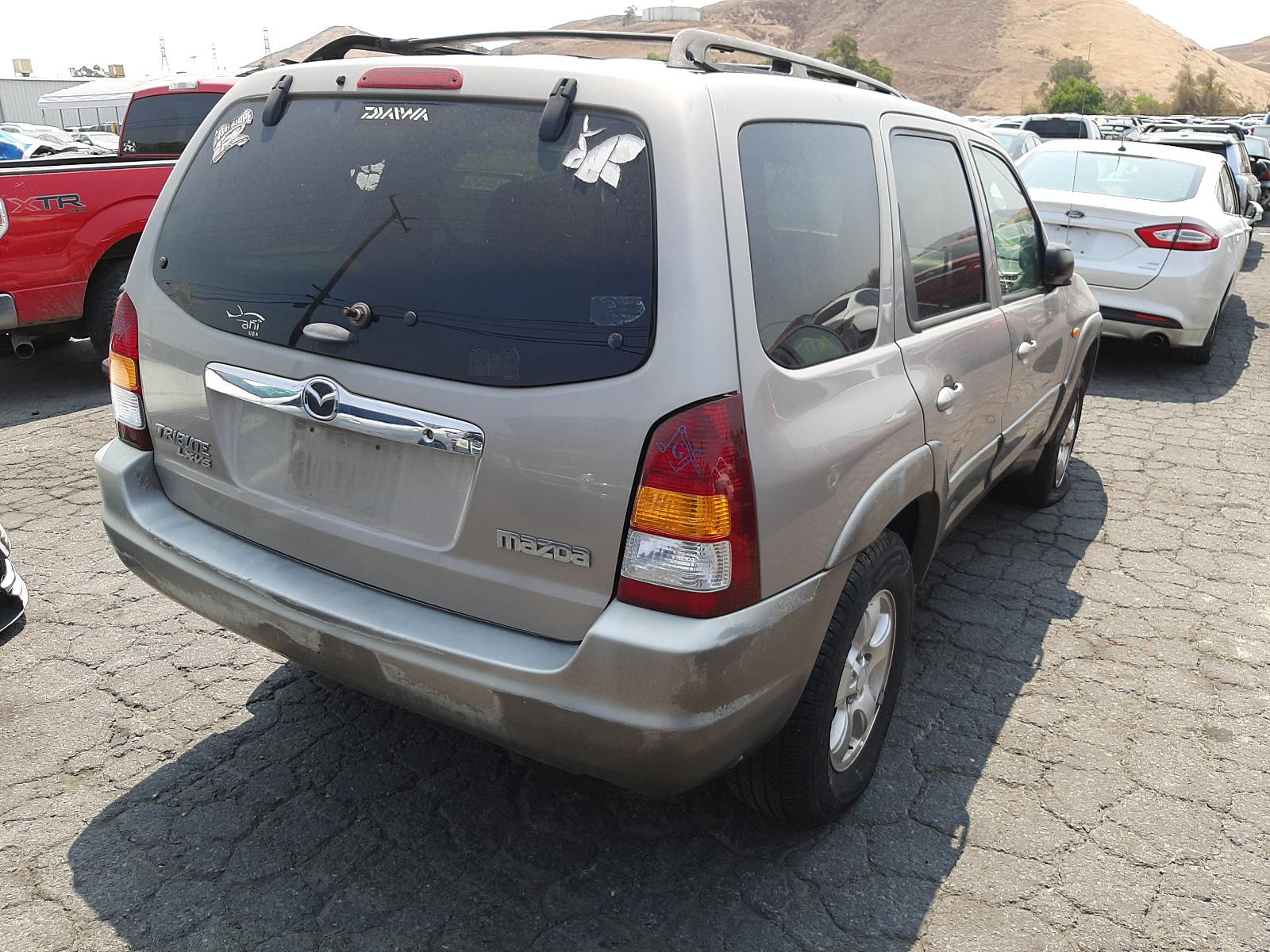 Photo 4 from auction – 2001 MAZDA TRIBUTE LX with VIN 4F2CU081X1KM50341