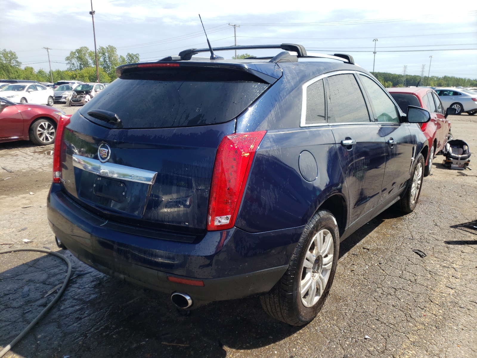 Photo 4 from auction – 2011 CADILLAC SRX LUXURY with VIN 3GYFNAEY3BS586490