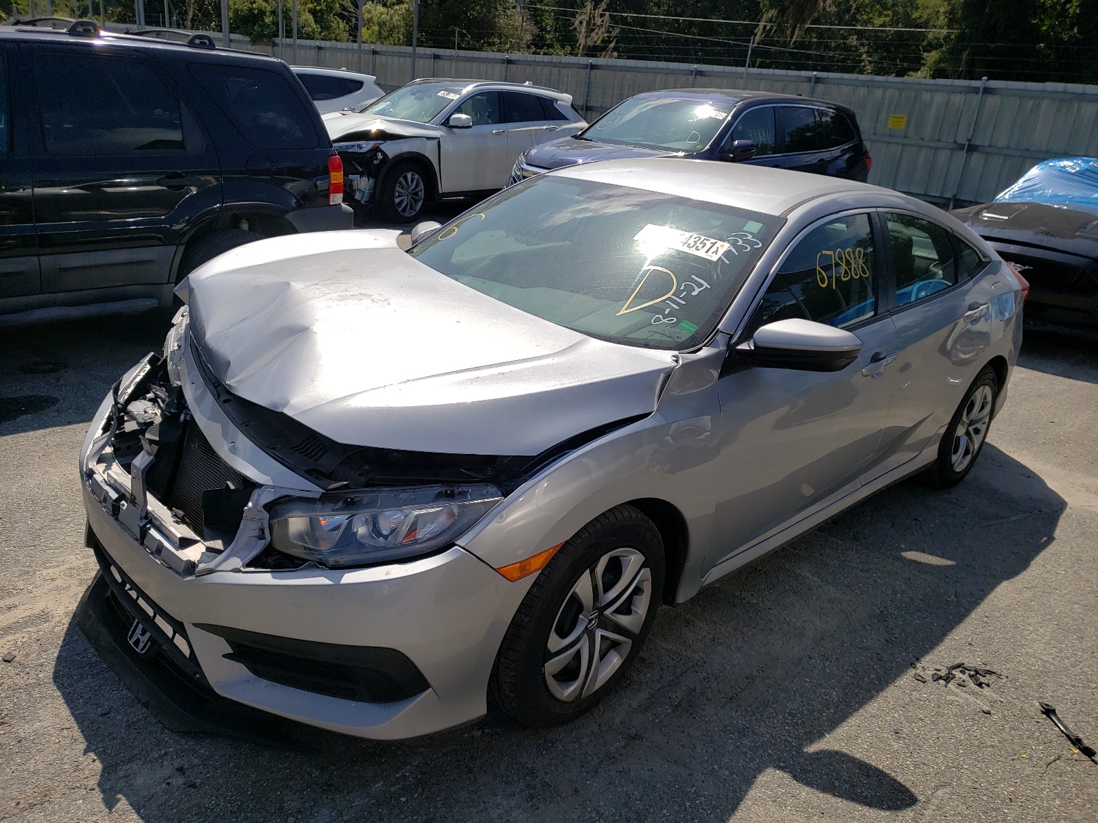 Photo 2 from auction – 2017 HONDA CIVIC LX with VIN 19XFC2F57HE047433