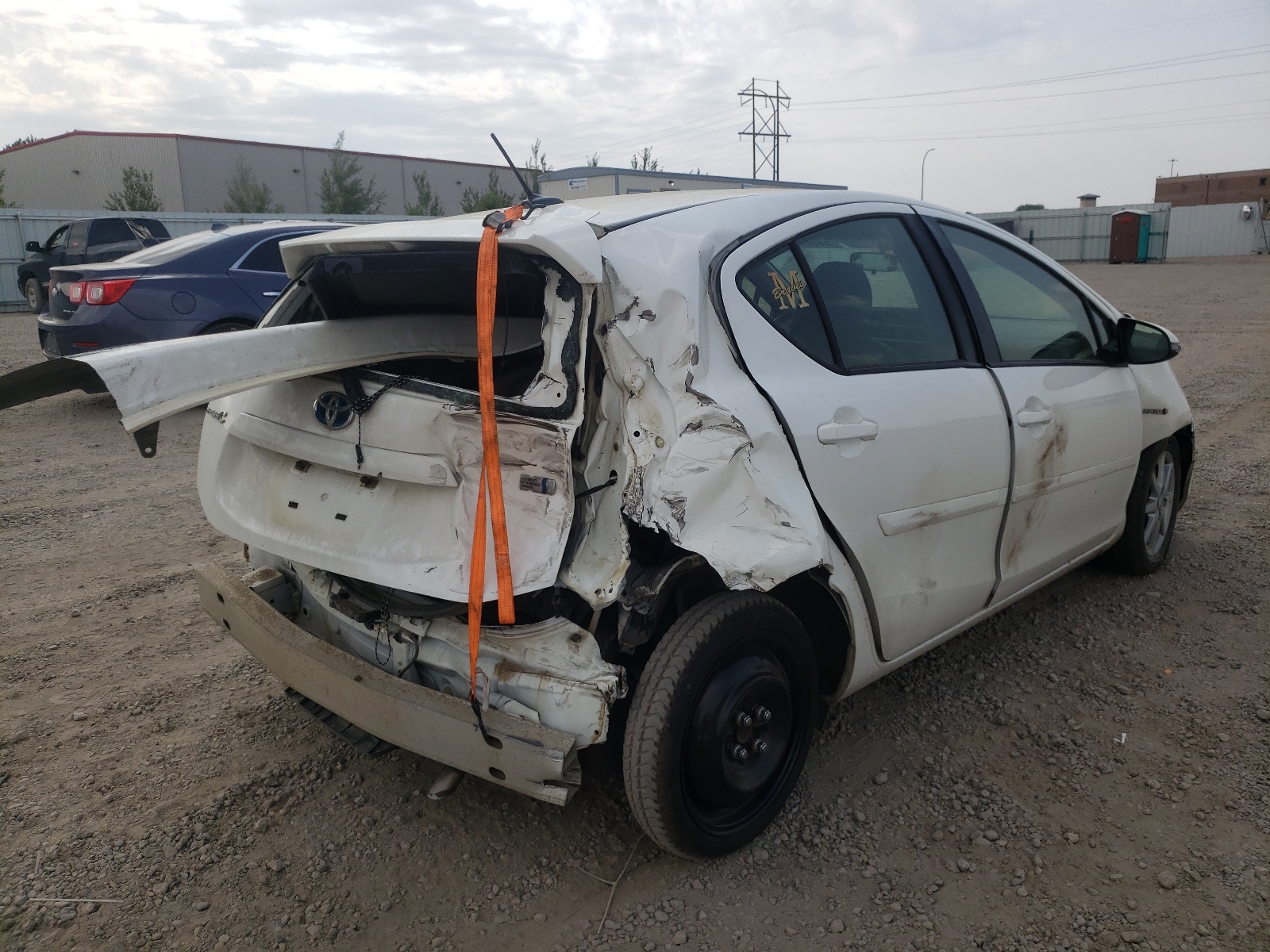 Photo 4 from auction – 2013 TOYOTA PRIUS C with VIN JTDKDTB33D1033144