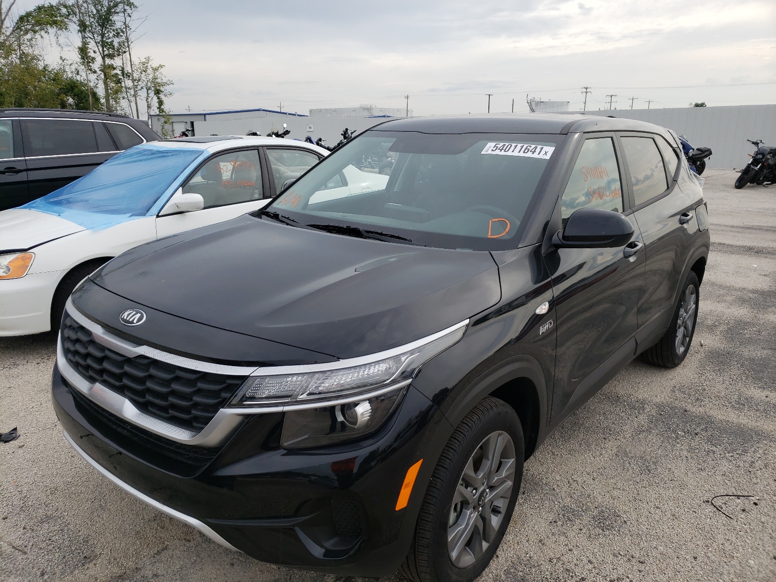 Photo 2 from auction – 2021 KIA SELTOS LX with VIN KNDEPCAA2M7158976