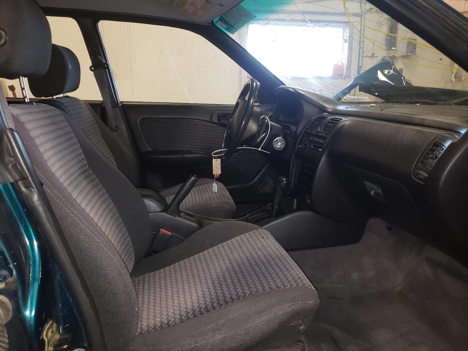 Photo 5 from auction – 1999 SUBARU LEGACY with VIN 4S3BG6852X7630482