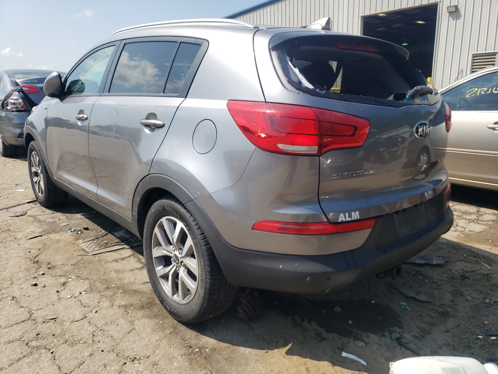 Photo 3 from auction – 2014 KIA SPORTAGE L with VIN KNDPBCAC7E7647965