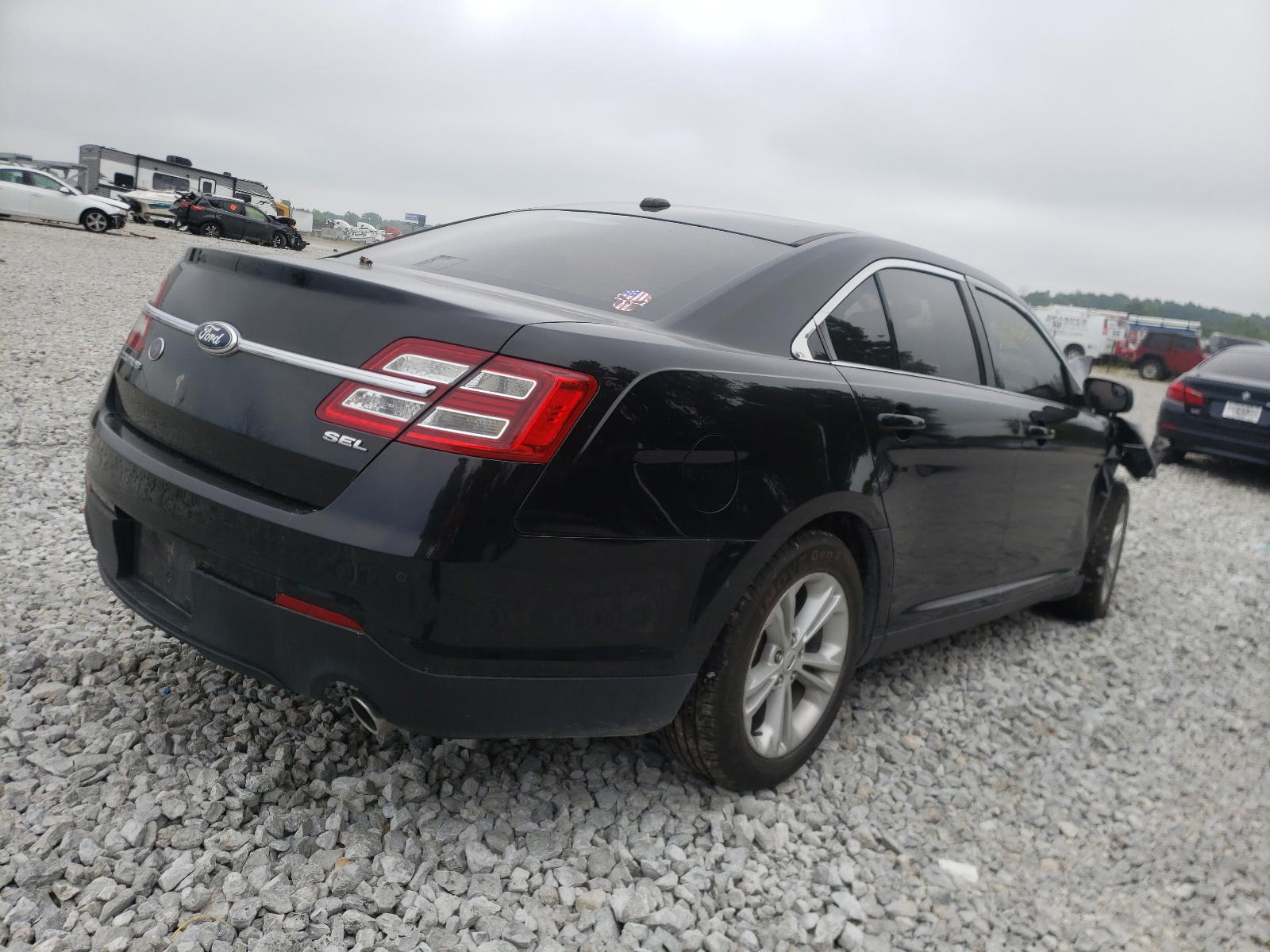 Photo 4 from auction – 2013 FORD TAURUS SEL with VIN 1FAHP2E8XDG130122