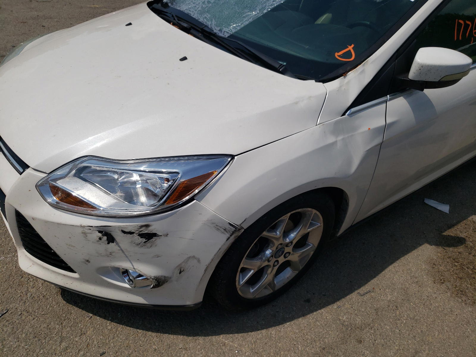 Photo 9 from auction – 2012 FORD FOCUS SEL with VIN 1FAHP3H22CL278011