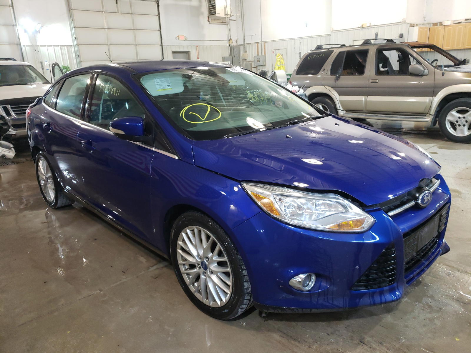 FORD FOCUS SEL 2012 with VIN 1FAHP3H29CL315670 - Photo from auction