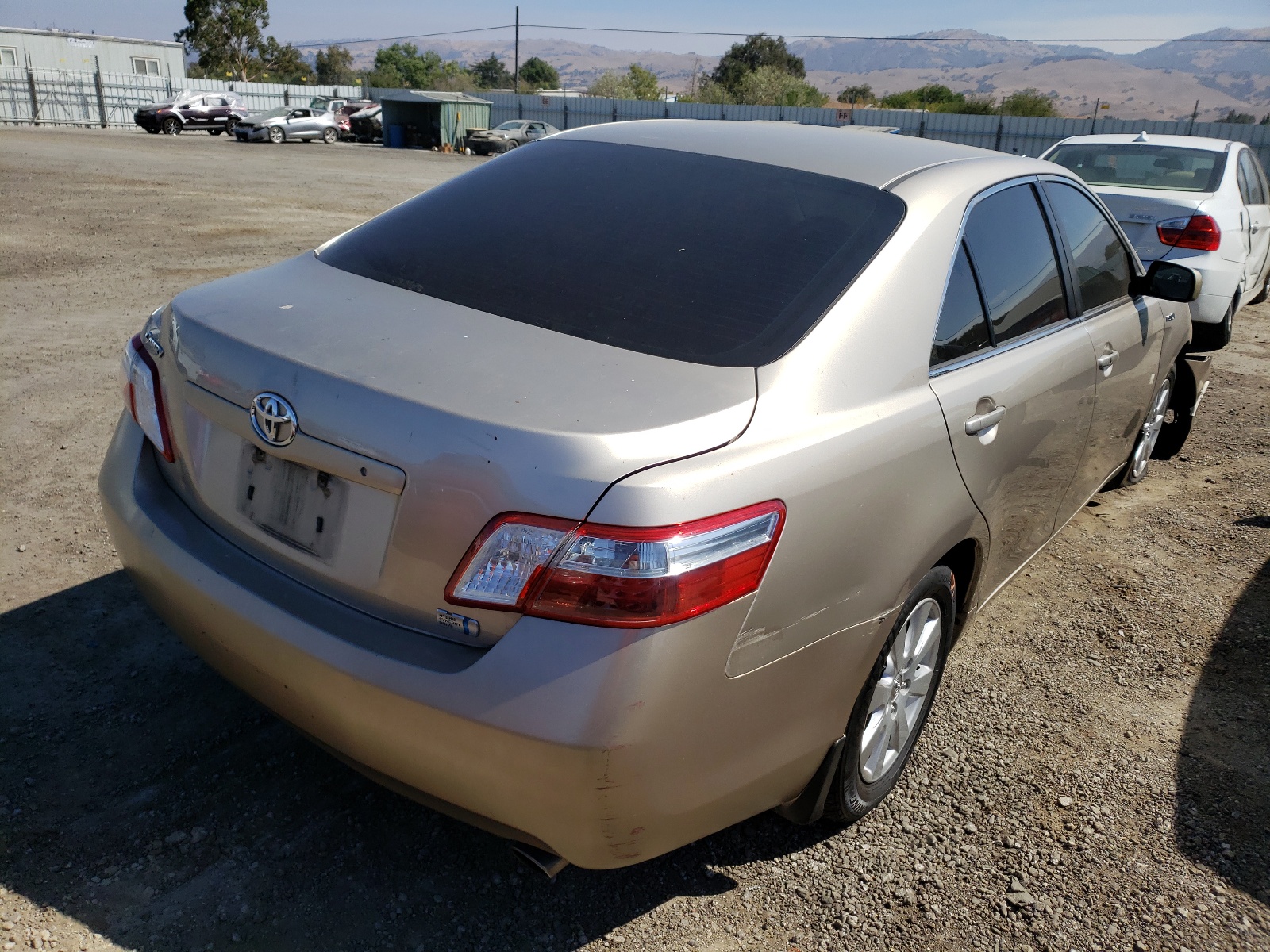 Photo 4 from auction – 2007 TOYOTA CAMRY HYBR with VIN JTNBB46K173030261
