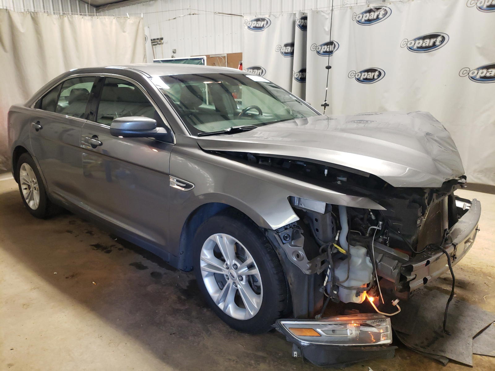FORD TAURUS SEL 2013 with VIN 1FAHP2E81DG165910 - Photo from auction