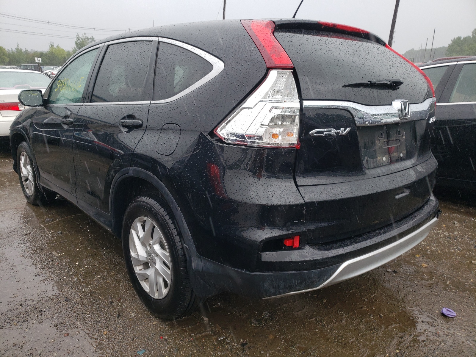 Photo 3 from auction – 2015 HONDA CR-V EX with VIN 2HKRM4H51FH611850