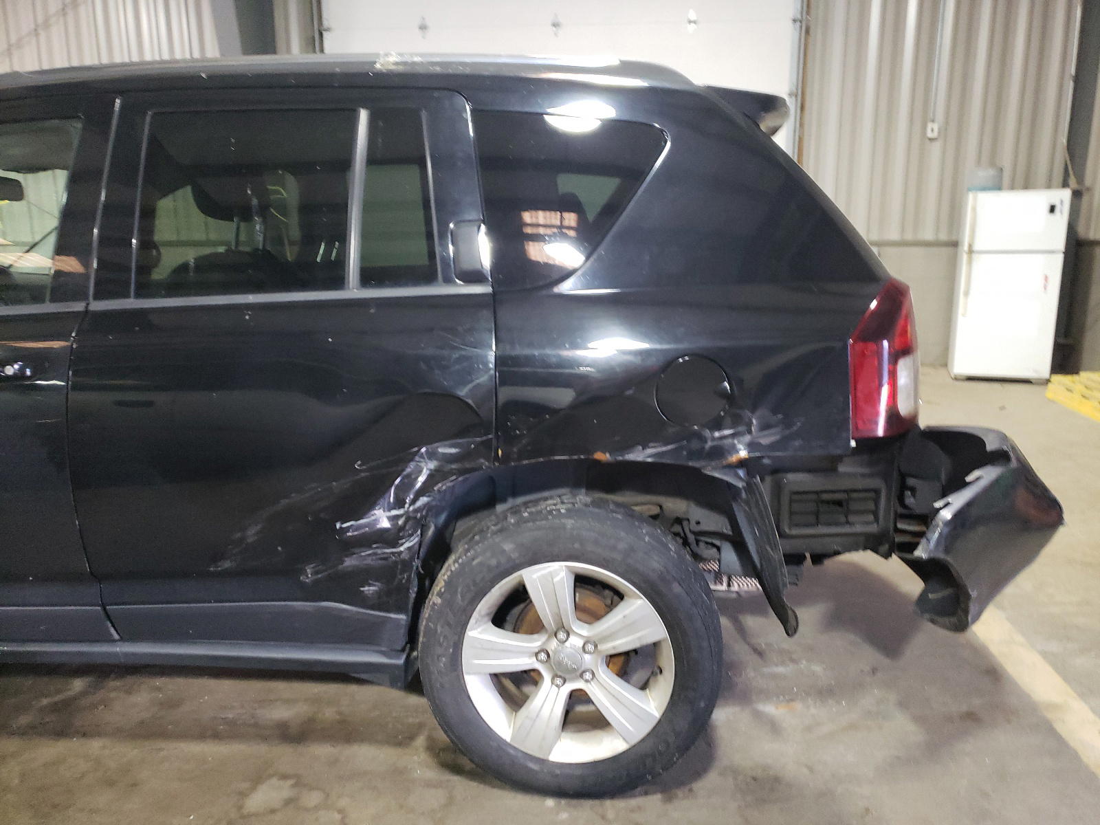 Photo 9 from auction – 2014 JEEP COMPASS LA with VIN 1C4NJDEB0ED600280