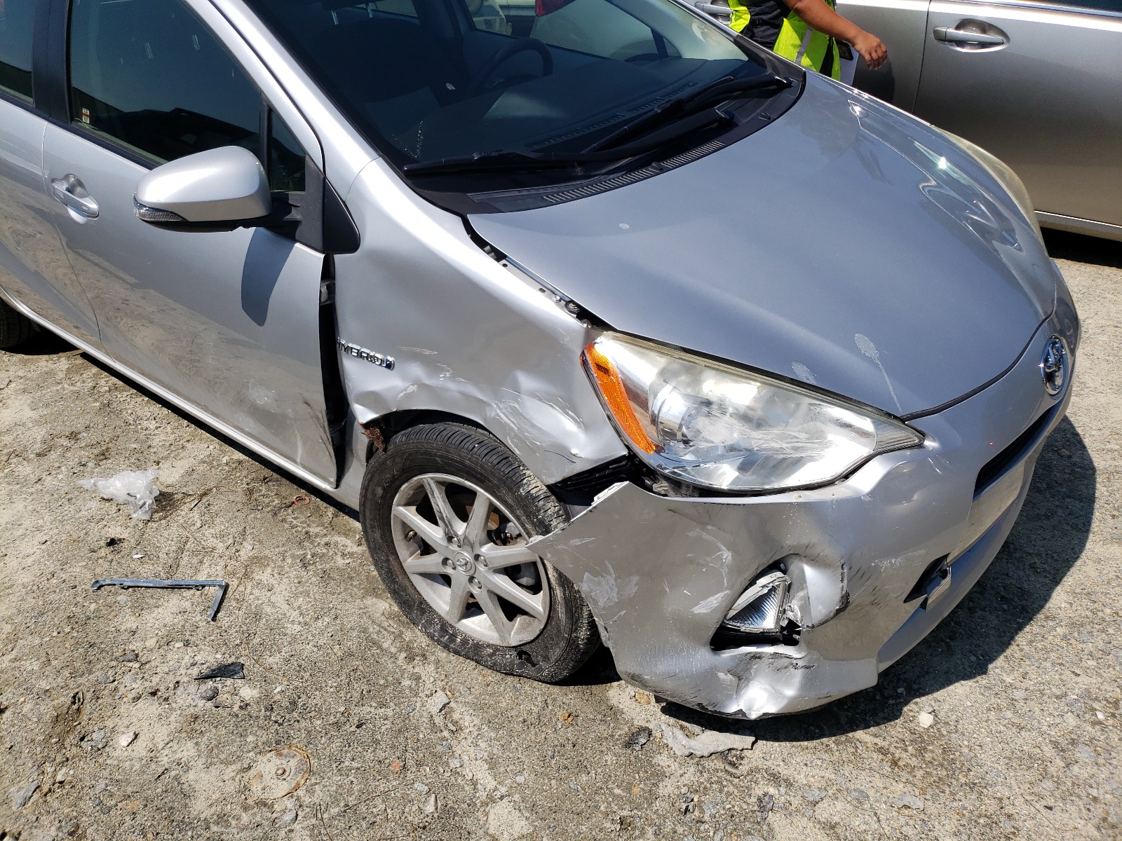 Photo 9 from auction – 2013 TOYOTA PRIUS C with VIN JTDKDTB30D1542737