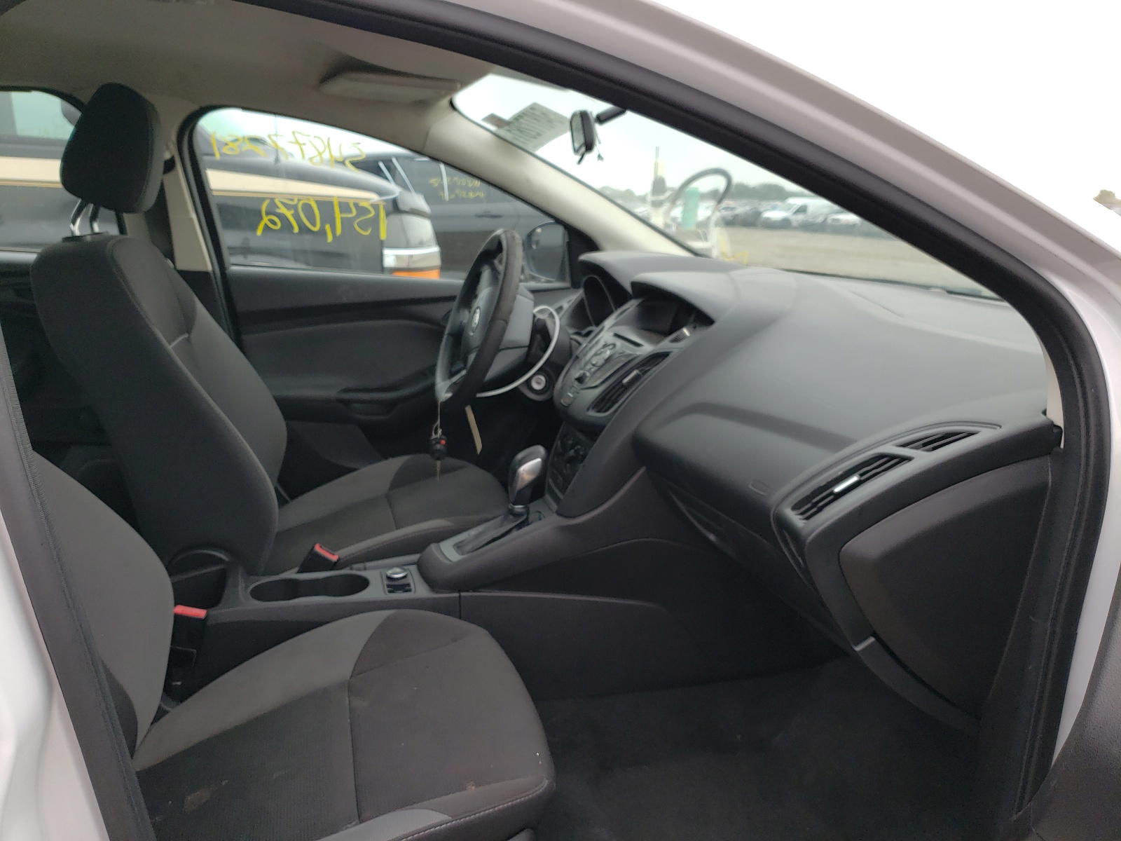 Photo 5 from auction – 2013 FORD FOCUS S with VIN 1FADP3E2XDL156341