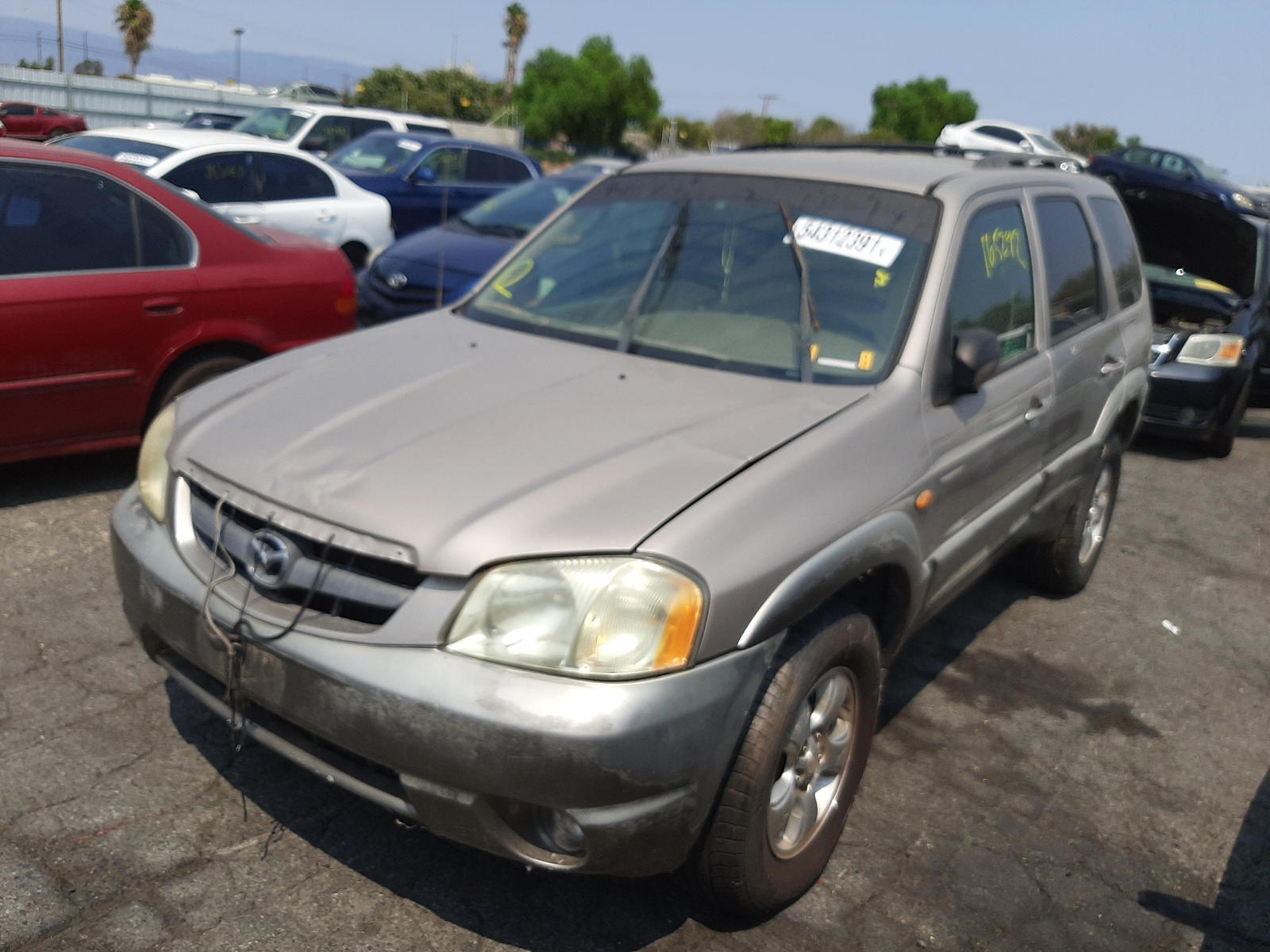 Photo 2 from auction – 2001 MAZDA TRIBUTE LX with VIN 4F2CU081X1KM50341