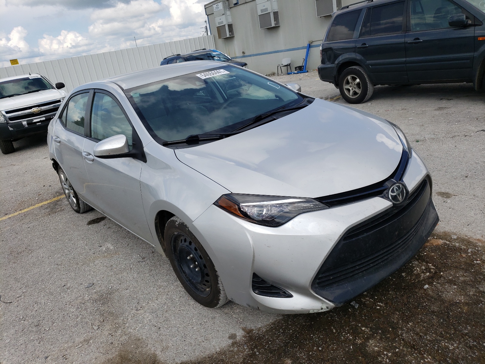 TOYOTA COROLLA L 2017 with VIN 5YFBURHE3HP634647 - Photo from auction
