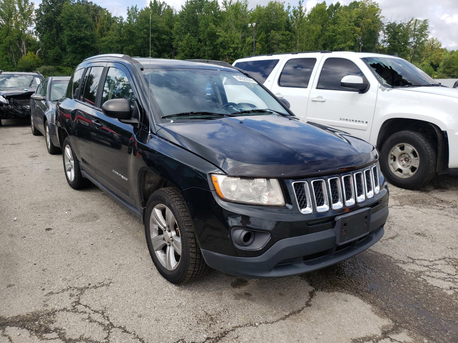 JEEP COMPASS LA 2013 with VIN 1C4NJDEB2DD145821 - Photo from auction