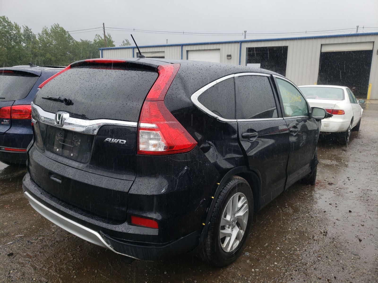 Photo 4 from auction – 2015 HONDA CR-V EX with VIN 2HKRM4H51FH611850