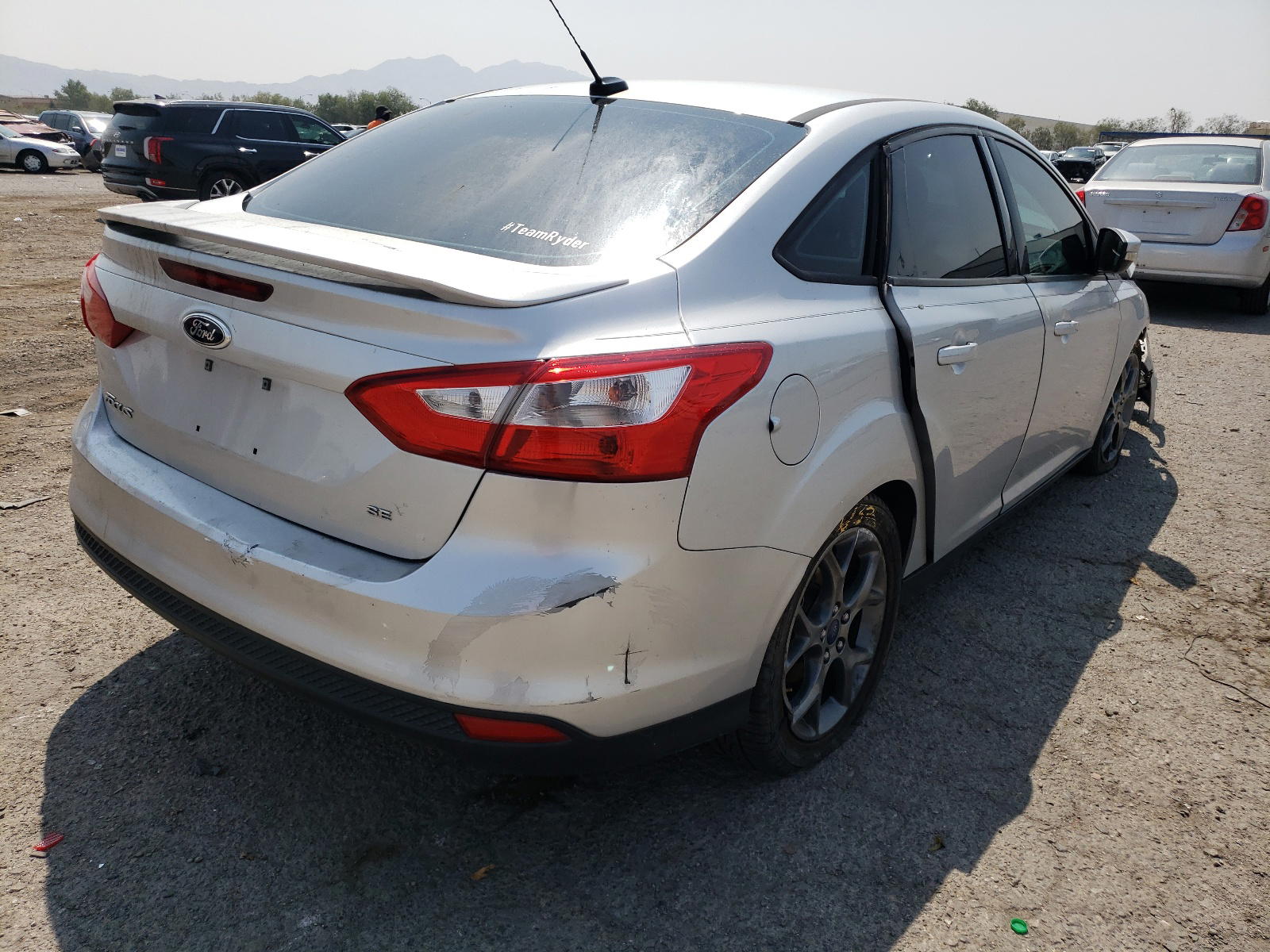 Photo 4 from auction – 2014 FORD FOCUS SE with VIN 1FADP3F22EL307222