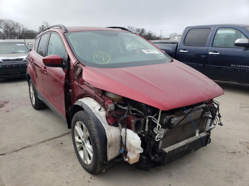 FORD ESCAPE SE 2018 with VIN 1FMCU0GDXJUC87458 - Photo from auction