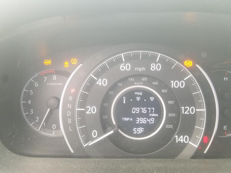 Photo 8 from auction – 2015 HONDA CR-V with VIN 2HKRM3H52FH514716