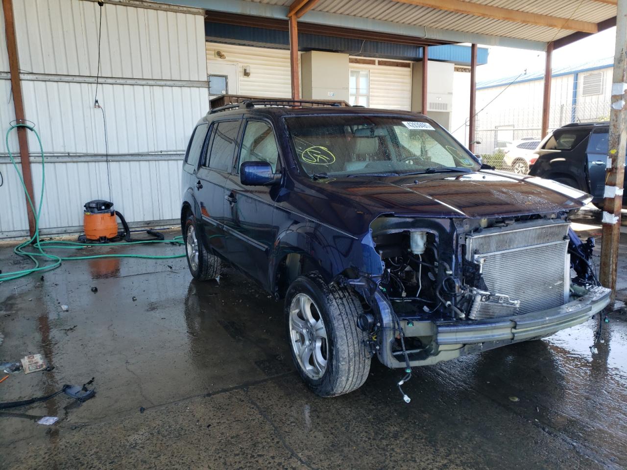 HONDA PILOT EXL 2013 with VIN 5FNYF4H52DB005863 - Photo from auction