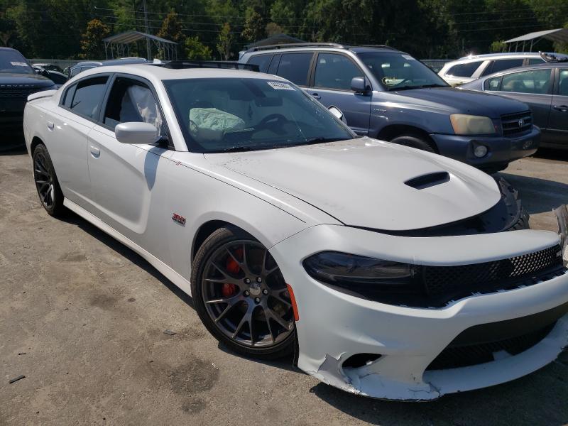 DODGE CHARGER SR 2016 with VIN 2C3CDXEJ5GH210812 - Photo from auction