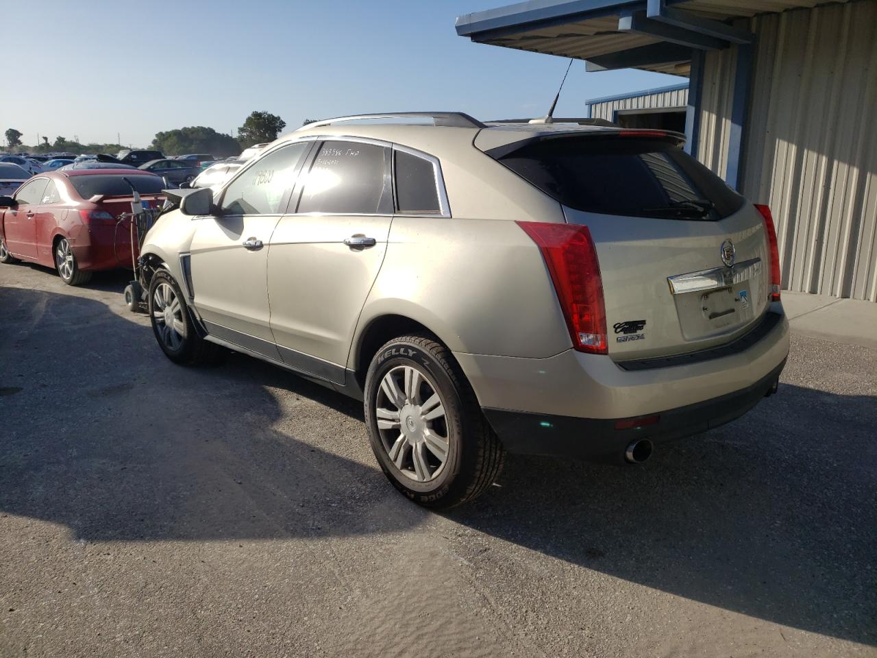 Photo 3 from auction – 2013 CADILLAC SRX with VIN 3GYFNAE39DS559592