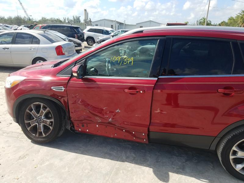 Photo 9 from auction – 2015 FORD ESCAPE TIT with VIN 1FMCU0J97FUA69084