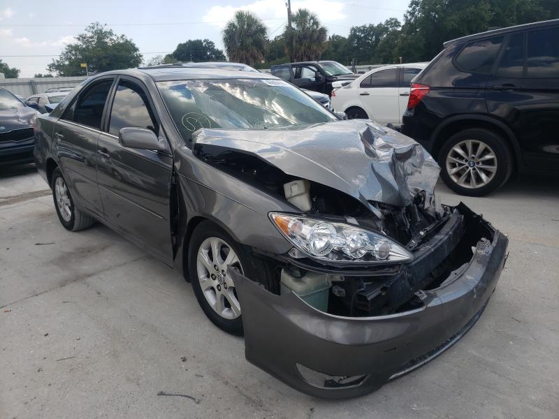 TOYOTA CAMRY LE 2005 with VIN 4T1BF30K85U617801 - Photo from auction