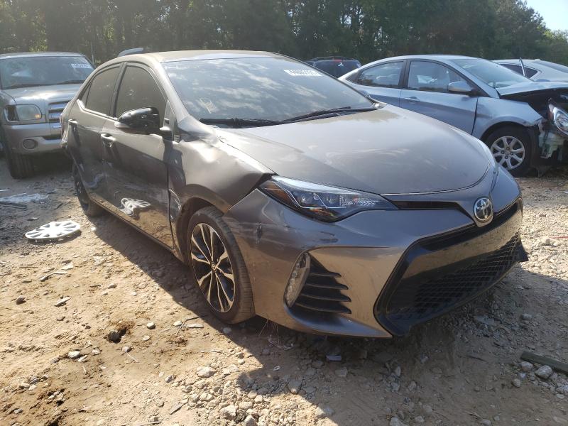 TOYOTA COROLLA L 2017 with VIN 5YFBURHE0HP581356 - Photo from auction