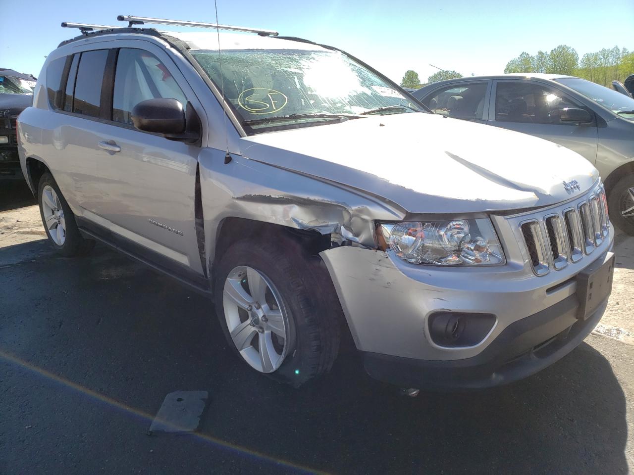 JEEP COMPASS SP 2011 with VIN 1J4NF1FB7BD219210 - Photo from auction