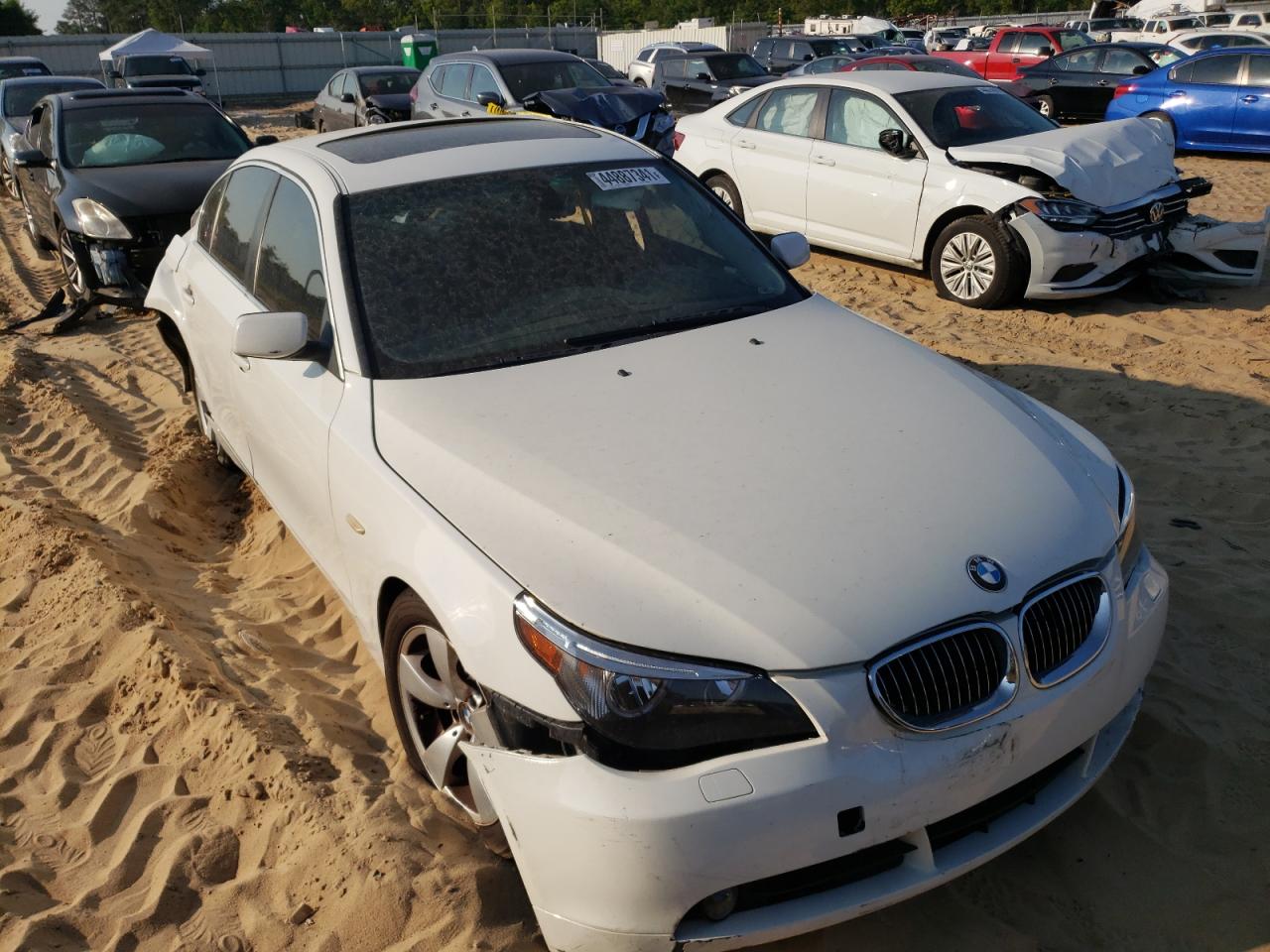 BMW 525 I 2007 with VIN WBANE53597CY08056 - Photo from auction