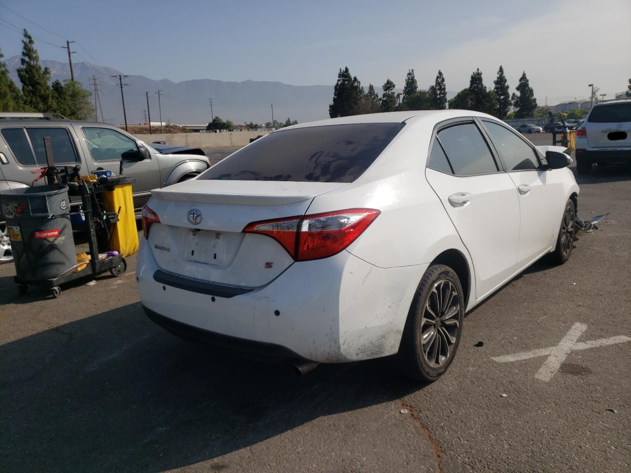 Photo 4 from auction – 2014 TOYOTA COROLLA L with VIN 5YFBURHE7EP022219