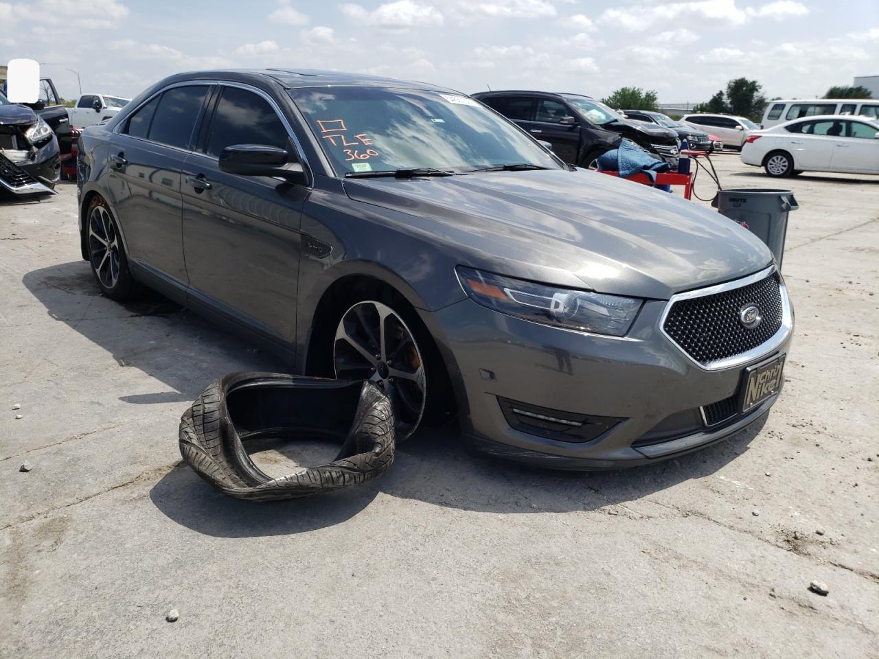 FORD TAURUS SHO 2016 with VIN 1FAHP2KT3GG129276 - Photo from auction