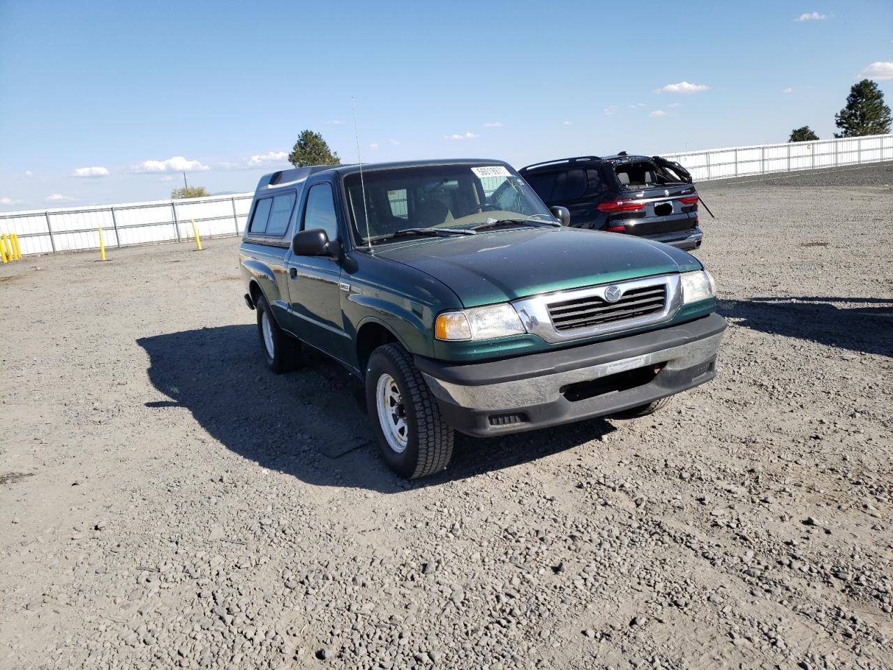 MAZDA B2500 1999 with VIN 4F4YR12C2XTM09042 - Photo from auction