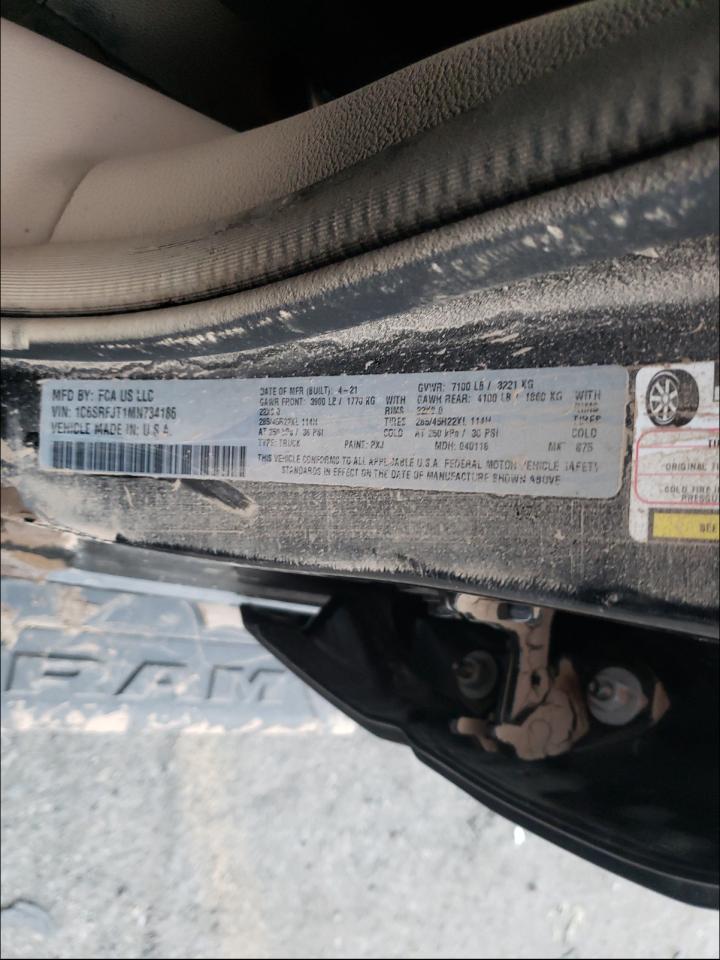 Photo 10 from auction – 2021 RAM 1500 LARAM with VIN 1C6SRFJT1MN734186
