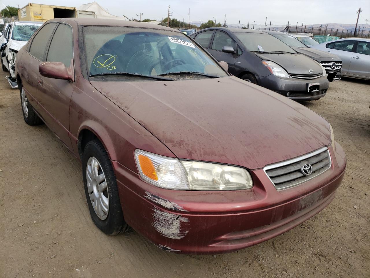 TOYOTA CAMRY CE 2000 with VIN 4T1BG22K9YU628573 - Photo from auction