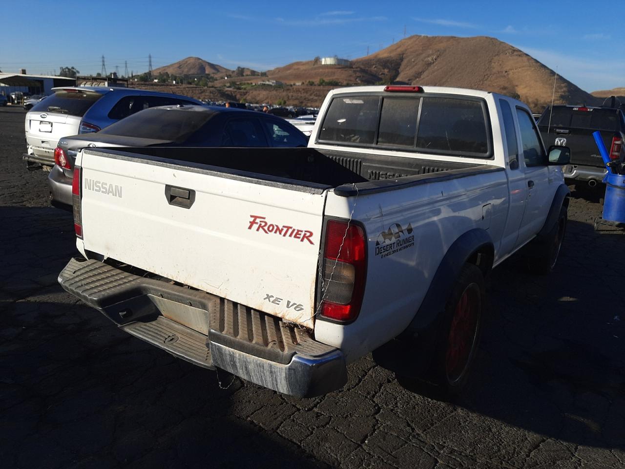 Photo 4 from auction – 2000 NISSAN FRONTIER K with VIN 1N6ED26T1YC396700