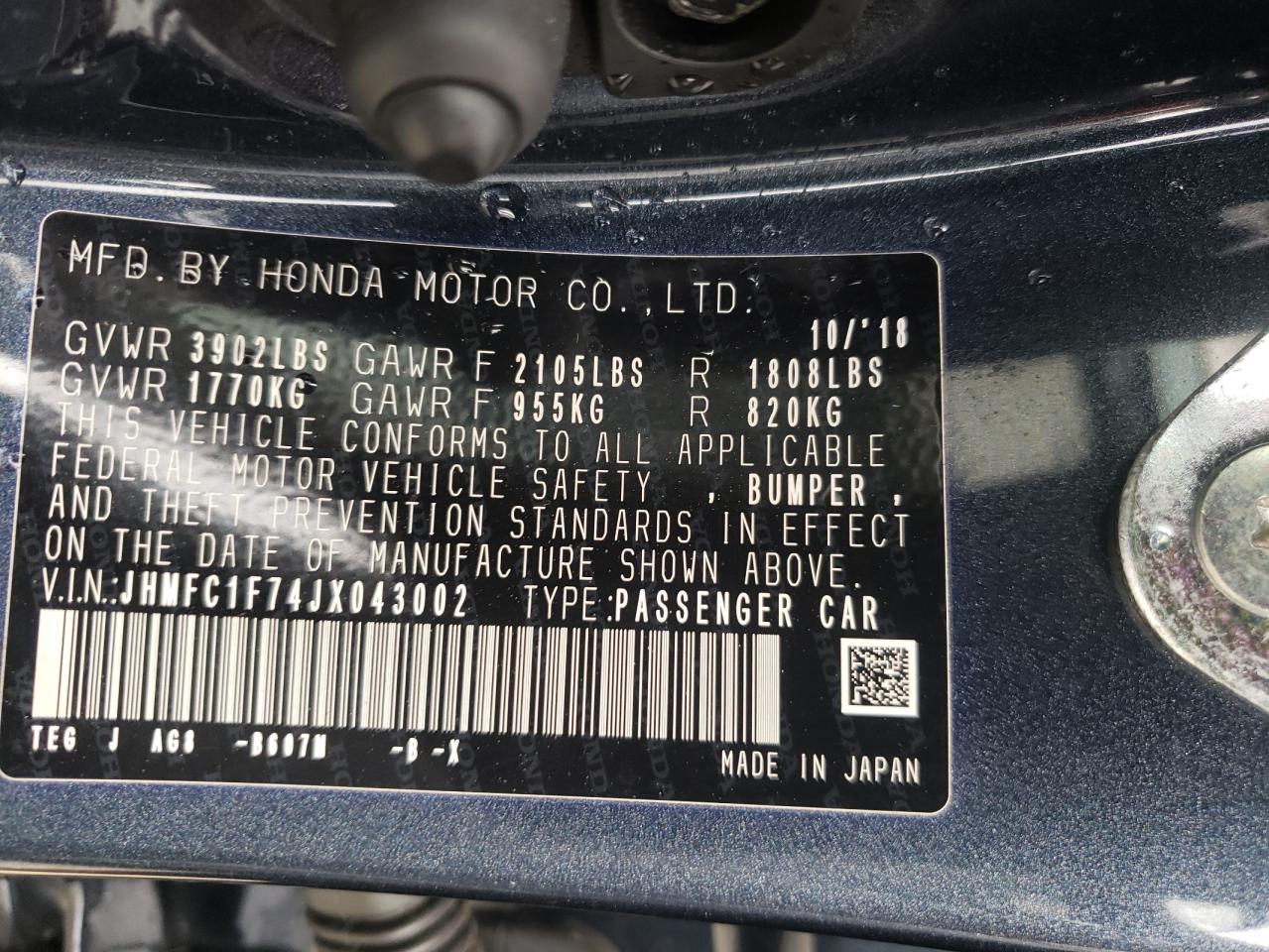 Photo 10 from auction – 2018 HONDA CIVIC EXL with VIN JHMFC1F74JX043002
