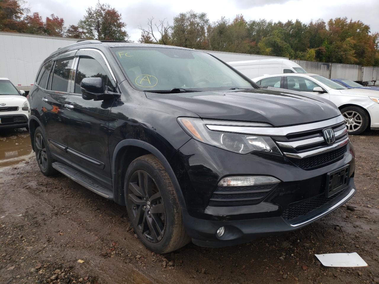 Photo 1 from auction – 2017 HONDA PILOT TOUR with VIN 5FNYF6H97HB040628