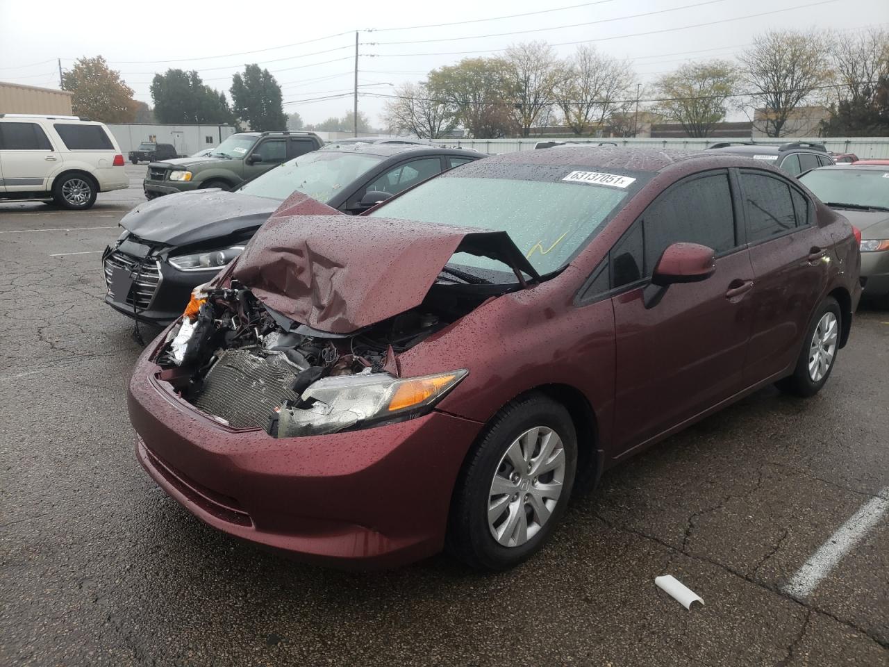 Photo 2 from auction – 2012 HONDA CIVIC LX with VIN 19XFB2F52CE031524