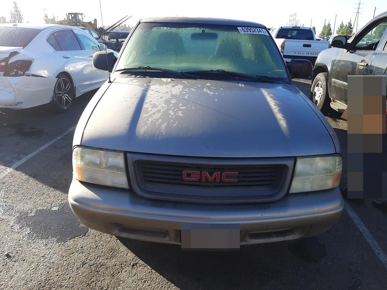 Photo 9 from auction – 2003 GMC SONOMA with VIN 1GTCS14H438278211